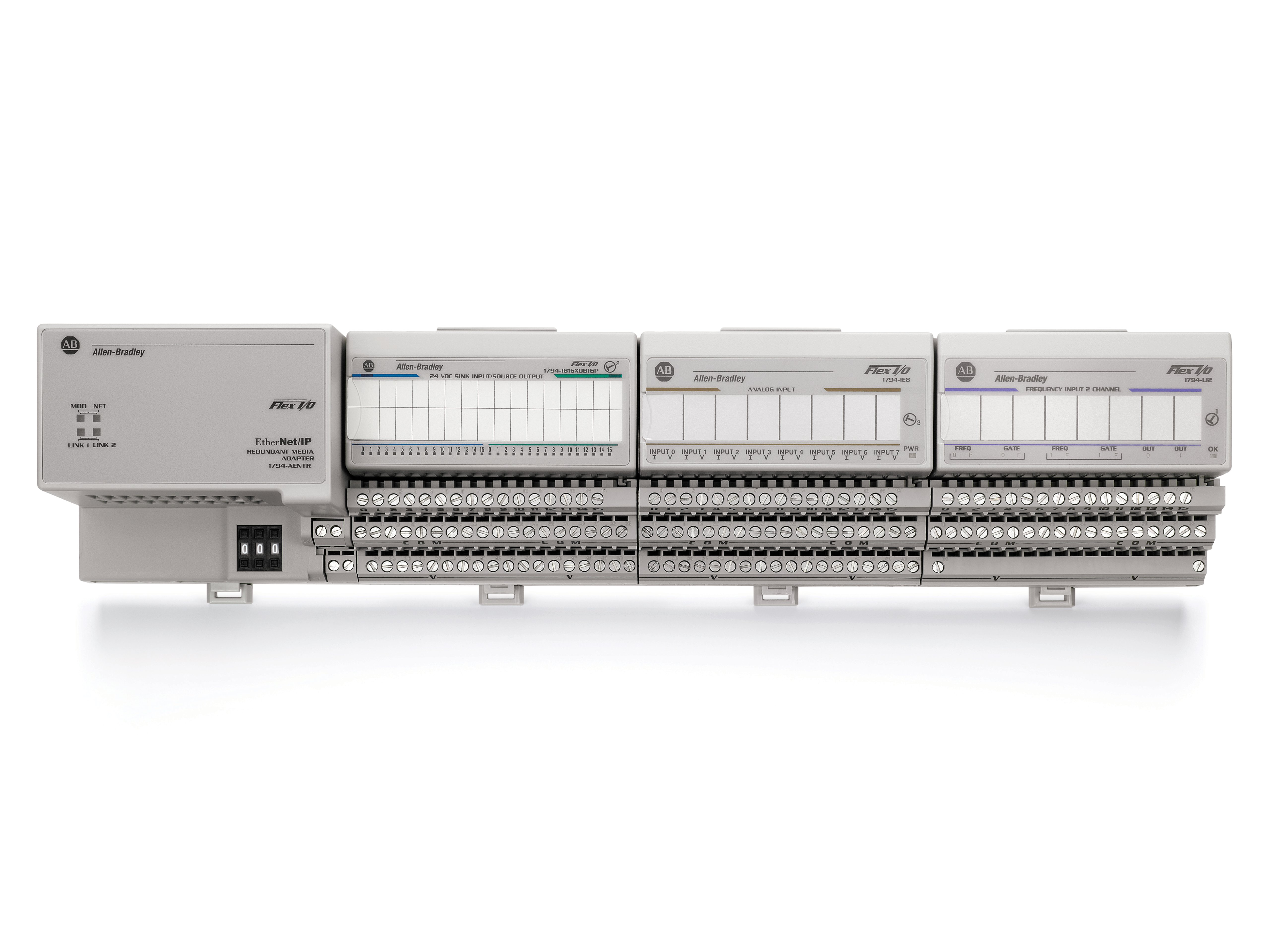 Front view of Allen-Brady FLEX I/O rack with an adapter and three I/O modules. From left to right, the catalogs are 1794-AENTR, 1794-IB16XOB16P, 1794-IE8 and 1794-IJ2
