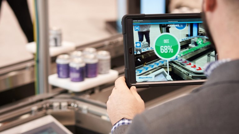 Engineer viewing performance with real-time software on his tablet